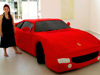 Illustration for article titled Knitted 1:1 Scale Ferrari Makes Perfect Xmas Stocking